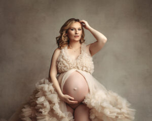 maternity session with cream dress