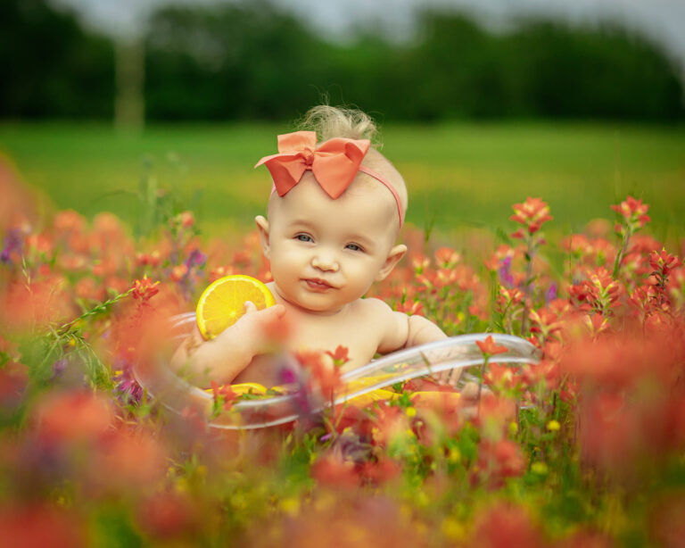 baby in flower field