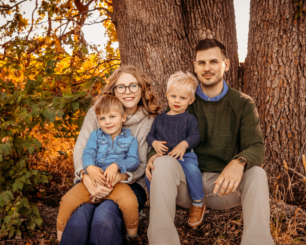 fall family photos with mom, dad, and two young boys. OKC Fall Mini Session.
