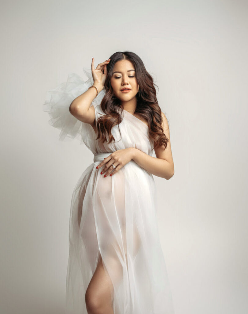 simple white gown in an OKC maternity photoshoot