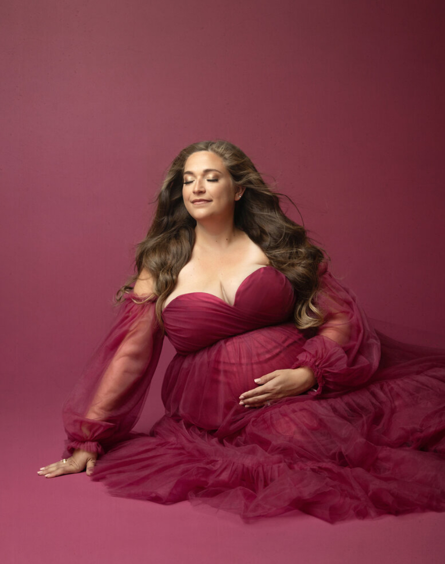 deep red flowy gown in OKC maternity photoshoot