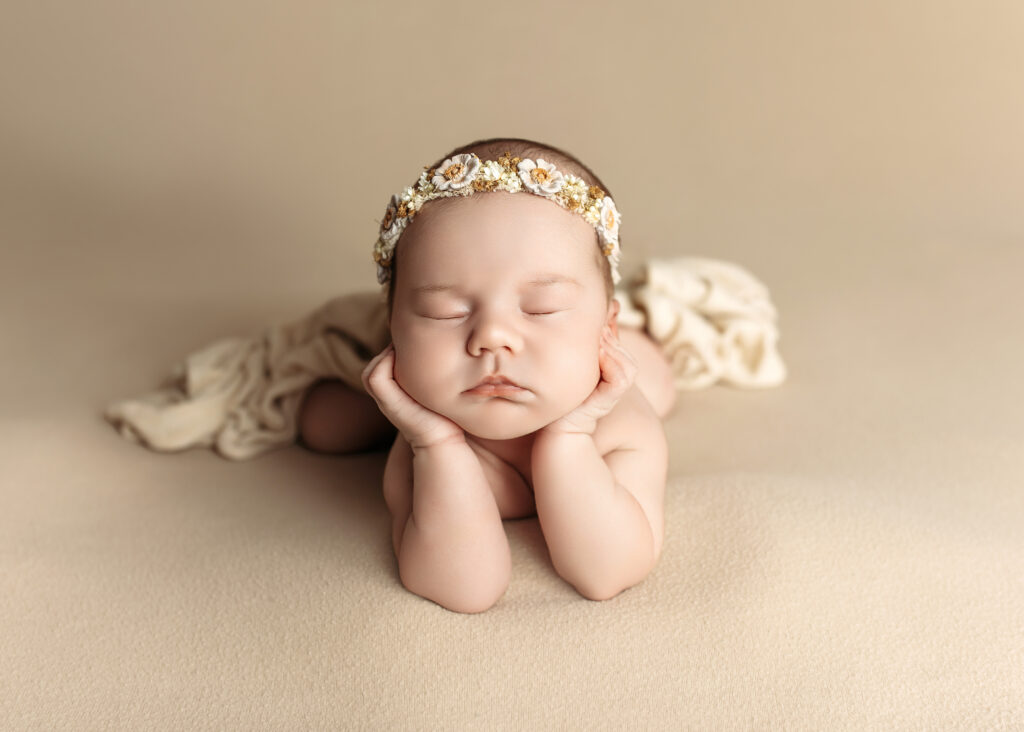 family photos ideas with infant, baby girl posed in froggy pose. oklahoma city newborn photographer.